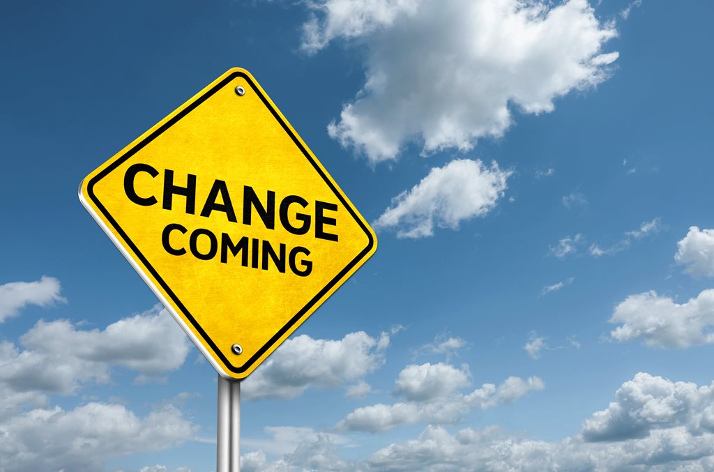 change coming yellow sign