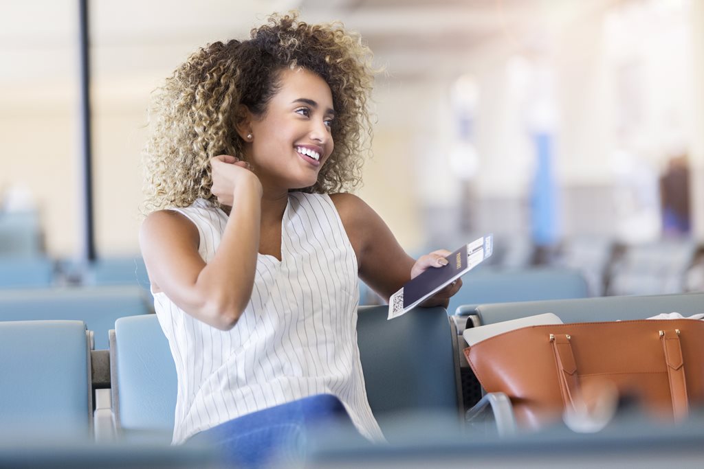 woman at airport with passport